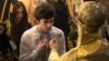 Some Orthodox traditions are being questioned amid tightening public-health restrictions.