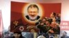 Плакат із карикатурою Ігоря Коломойського під час акції «За ринок землі» під Офісом президента України. Її учасники вимагали «нормальної праволіберальної земельної реформи не під конкретних осіб, а для українців». Київ, 24 жовтня 2019 року