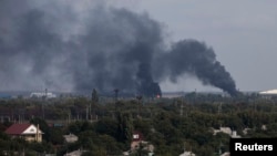 Дым над аэропортом Донецка 23 сентября