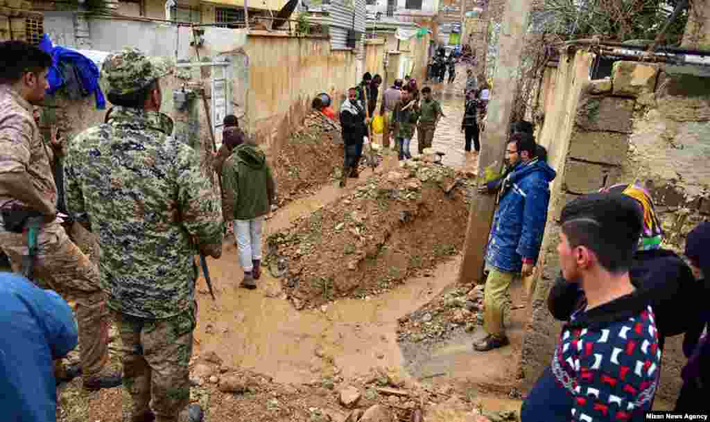 Flood damage in Shiraz. The city is a popular destination for Iranians during and around the New Year's holiday of Norouz, which took place on March 20. 
