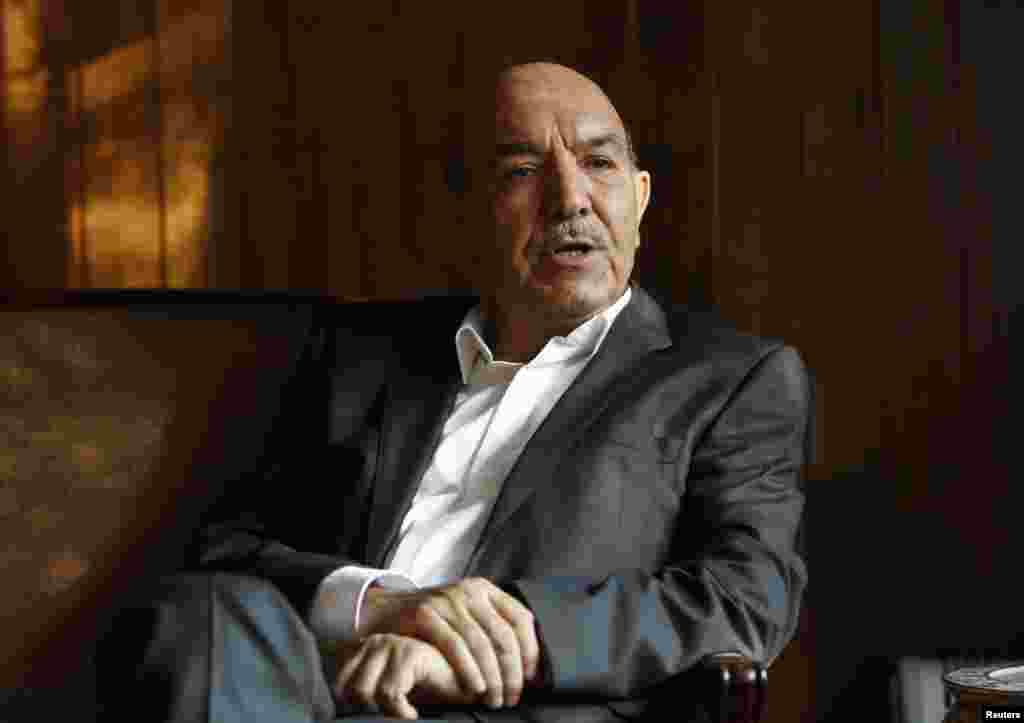 Qayum Karzai -- WITHDRAWN   Pashtun   Vice-presidential running mates: Wahidullah Shahrani (ethnic Uzbek) and Ibrahim Qasemi (Hazara)   Qayum Karzai (born in 1957), outgoing President Hamid Karzai's older brother, is a prominent technocrat.   He is also a businessman and former lawmaker. Interestingly, Qayum has not received the backing of his brother.   Qayum was to have run with Wahidullah Shahrani, an ethnic Uzbek who has served as minister of mines, and Ibrahim Qasemi, a Hazara and former member of parliament. He announced his withdrawal from the race in early March and urged his supporters to vote for Zalmai Rasul.
