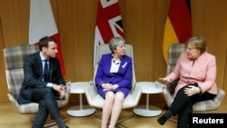 Президент Франции, премьер-министр Великобритании и канцлер Германии на саммите в Брюсселе