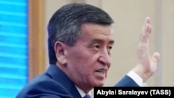 Sooronbai Jeenbekov attends an extraordinary session of parliament in Bishkek on October 16, one day after his resignation.