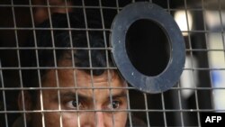 An Indian soldier patrols outside Nariman House, the scene of one of the attacks