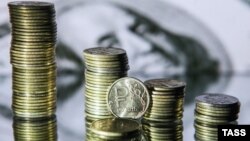 Первый день после выборов в США рубль, как и цены на нефть, завершил на уровнях, близких к отмеченным накануне