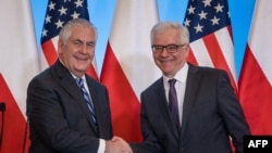U.S. Secretary of State Rex Tillerson (left) and Polish Foreign Minister Jacek Czaputowicz in Warsaw on January 27.