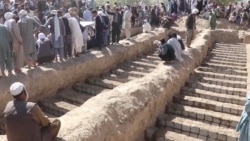 Afghans Bury Loved Ones Killed In Mosque Bombing Afghans Bury Loved Ones Killed In Mosque Bombing