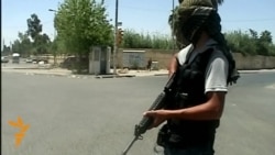 ISIL Fighters Patrol Streets Of Mosul