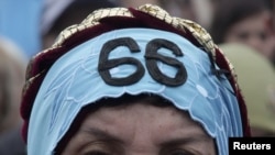 A Crimean Tatar in Simferopol in May attends a ceremony marking the anniversary of the people's deportation from the peninsula to distant parts of the Soviet Union
