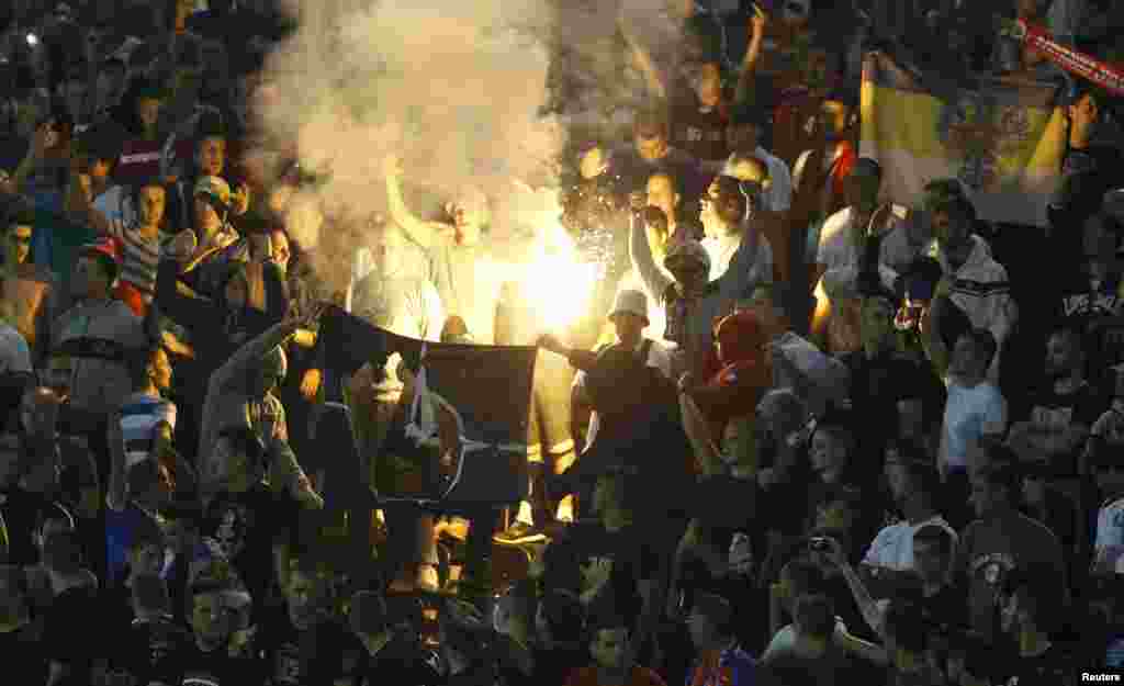 Serbian emotions were high, with fans burning a NATO flag in the stands during the action. As a precaution, no Albanian fans had been allowed to attend the match.