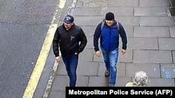 "There was muddy slush everywhere": A photo released by British police shows shows two men they identified as Aleksandr Petrov (right) and Ruslan Boshirov walking on Fisherton Road in Salisbury on March 4.