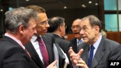 Luxembourg Foreign Minister Jean Asselborn (left) and Finnish counterpart Alexander Stubb (center) with EU foreign-policy chief Javier Solana in Brussels