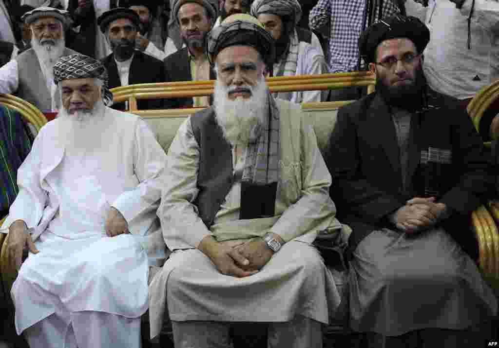 Abdul Rasul Sayyaf (center)   Pashtun   Vice-presidential running mates: Ismail Khan (ethnic Tajik) (left in photo) and Abdul Wahab Erfan (ethnic Uzbek) (right in photo)   Sayyaf (born in 1946) is an influential lawmaker from Kabul who is one of the most controversial and conservative of the candidates.   He is an Egyptian-trained cleric who is credited with bringing leading Al-Qaeda figures -- including former leader Osama bin Laden -- to Afghanistan during the Soviet occupation in the 1980s.   Sayyaf’s right-hand man, Khan, is the former energy and water minister. Khan, a former Tajik warlord from Herat Province, is referred to as the emir (or king) of western Afghanistan.
