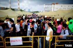 Russia's human rights ombudsman has expressed concerns that conditions at the Moscow tent camp "do not comply with government provisions."