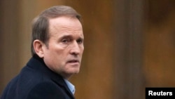 Ukrainian power broker Viktor Medvedchuk, a close associate of Russian President Vladimir Putin, arrives in Minsk to take part in Ukrainian peace talks in January 2015.