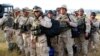 Iraqi Troops Take Over From Withdrawn Georgians