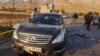 The aftermath of the attack that killed Iranian nuclear scientist Mohsen Fakhrizadeh near Tehran on November 27.