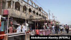 The aftermath of a bomb attack in the southern Iraqi city of Basra on May 20.