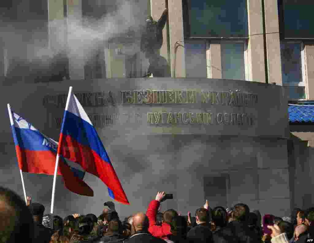 Some pro-Russian activists in Luhansk broke into the headquarters of Ukraine's regional security service, the SBU. 