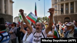 Protesters shout anti-government slogans during a protest in the Bulgarian capital, Sofia, on September 10.