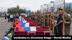 Похороны жертв трагедии в поселке Светлый