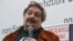 RUSSIA -- Writer Dmitry Bykov during a presentation of his books "Removal Service" and "Listed Out" in Moscow, March 28, 2021