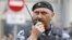 Колишній командир спецпідрозділу «Беркут» Сергій Кусюк у формі ОМОНу на мітингу в Москві, 12 червня 2017 року