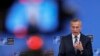 NATO Secretary-General Jens Stoltenberg speaks to reporters after an extraordinary meeting of NATO foreign ministers in Brussels on January 7.