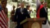 Afghanistan: Rumsfeld, Karzai Present United Front On Terror