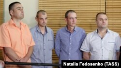 Четверо освобожденных украинских пленных в Минске, 28 июня 2019 год
