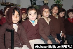 Shama (at left) and her classmates