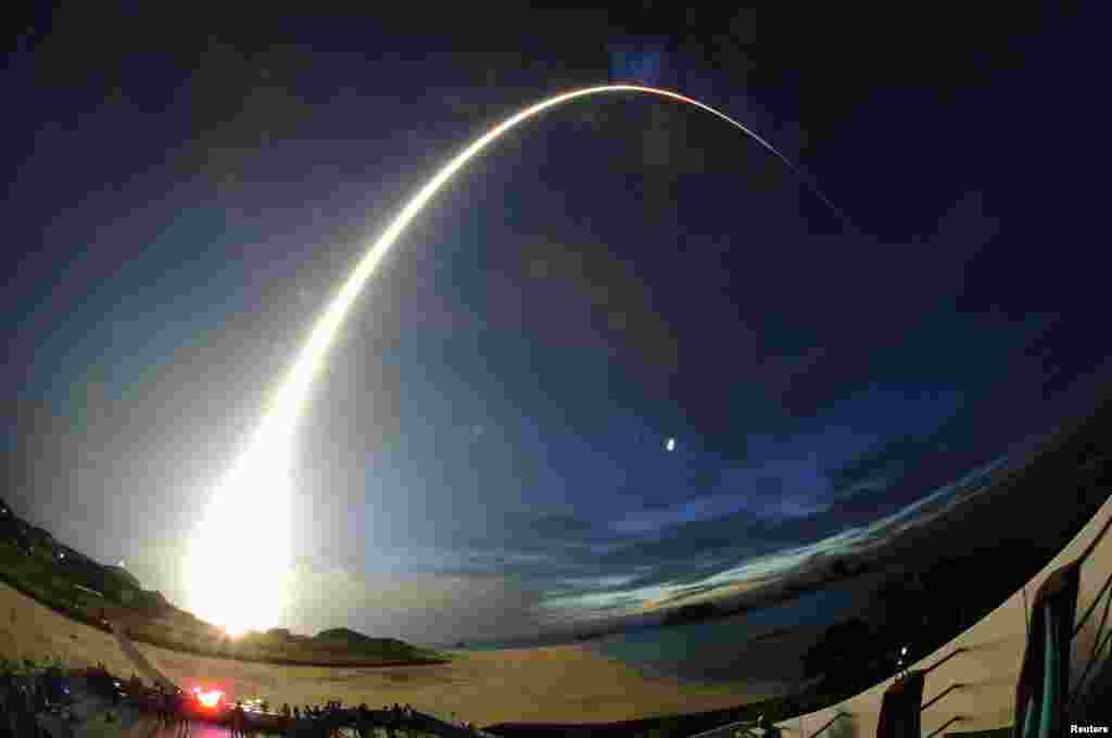An H-2B rocket carrying cargo for the International Space Station blasts off from the launch pad at the Tanegashima Space Center on the Japanese island of Tanegashima, about 1,000 km southwest of Tokyo, in August 2013. The rocket, also known as "Kounotori," which means stork, carried a small robot to help Japanese astronaut Koichi Wakata conduct experiments in space.
