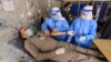 A health workers undergoes a medical checkup after receiving a dose of Sinopharm's coronavirus vaccine, donated by China, at a vaccination center in Peshawar on February 3.