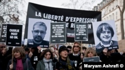 В Париже демонстрация в поддержку сатирического журнала Charlie Hebdo, 14 января 2015