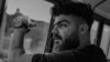 Iranian rapper Saman Yasin has detailed harrowing accounts of physical and psychological torture he says he has endured since being taken into custody.