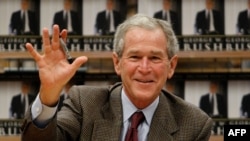 George W. Bush signing copies of his new memoir "Decision Points"