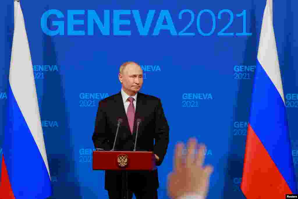 President Vladimir Putin holds a news conference after the U.S.-Russia summit. 