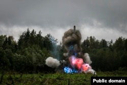 An Iskander system fires a tube-launched missile during a military drill near St. Petersburg in 2017.