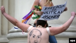 Femen activists have staged several "topless" protests on various issues in the past year.