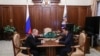 Президент РФ Владимир Путин и врио главы Калмыкии Бату Хасиков, 20 марта 2019 г.