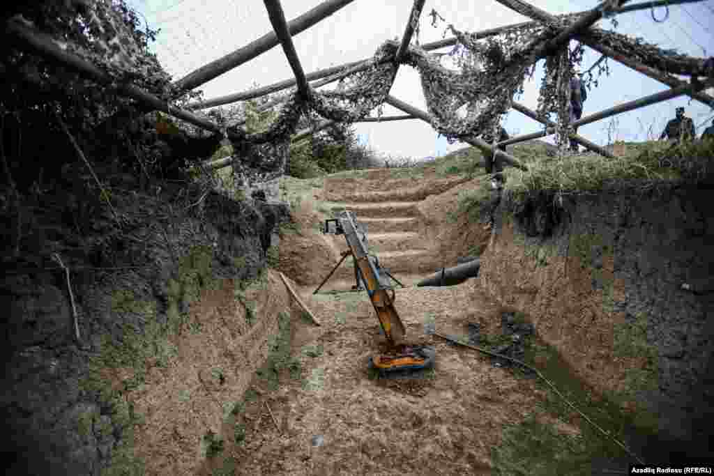 This Armenian homemade 200-millimeter gun was found in an abandoned trench. 