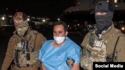 Муҳаммад Шарифуллоҳро 5 март аз Покистон ба ИМА истирдод карданд. Акс аз саҳифаи Х-и Кеш Пател
