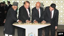 Turkmen President Gurbanguly Berdymukhamedov (far-right), Indian Vice President, Hamid Ansari (left), Afghan President Ashraf Ghani (second-right) and Pakistani Prime Minister Nawaz Sharif ceremonially press a button to begin welding on the TAPI gas pipeline in 2015. Although Berdymukhammedov has said work on TAPI should be done by the end of 2019, few believe this to be true.