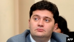 Former Georgian Interior Minister Bacho Akhalaia has been charged with the torture and illegal incarceration of soldiers.