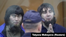 Anzor Gubashev and Zaur Dadayev sit in a Moscow court on July 13 as they are sentenced for the murder of Russian opposition politician Boris Nemtsov.