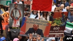 Одна из многочисленных мировых демонстраций против российского военного вмешательства в Сирии. Сидней, декабрь 2015 года