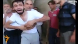 Video Shows Father Reunited With Son After Syrian Attack Video Shows Father Reunited With Son After Syrian Attack