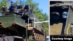 Bellingcat investigators say they have identified some unique characteristics of the Russian Buk M1 self-propelled missile launcher (pictured), which was photographed in separatist-controlled eastern Ukraine at the same time as when Flight MH17 was shot down.