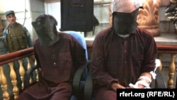 Two of the defendants are seen in the dock in Kabul on September, where the court needed just a few hours to sentence the seven men to death for the attack, which took place in the district of Paghman.