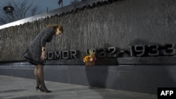 Ukraine's first lady Maryna Poroshenko attends the unveiling in Washington of a monument to the victims of the Ukrainian famine of the 1930s.